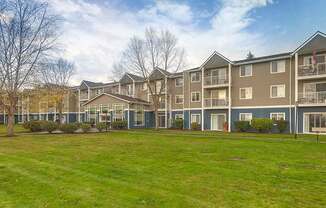 Grass Field and Apt Building at VINTAGE AT BREMERTON, Bremerton, WA, 98310