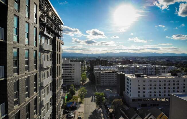 Exterior view of Civic Lofts building with gleaming sun