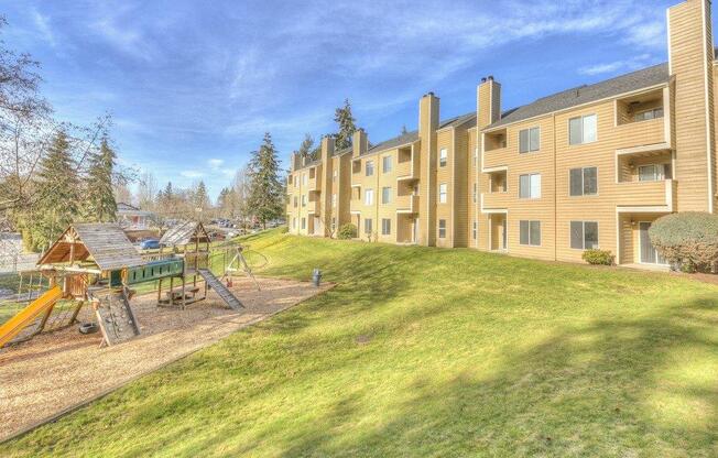 Nickel Creek Apartments in Lynwood, Washington Playground and Exterior