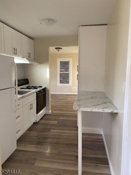 122 E MAIN ST