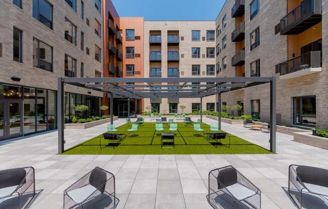 Courtyard with seating area at TREO Apartments, Cleveland, OH