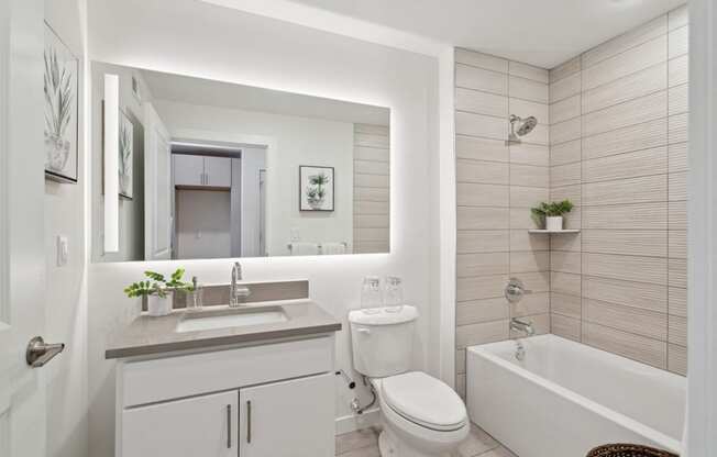 Bathroom with a sink toilet and a mirror  at The Anchorage on Kelly, Philadelphia