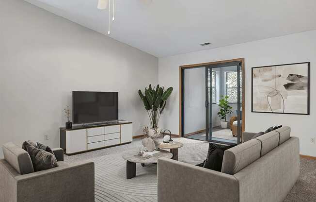 Apartment living room with a door to patio