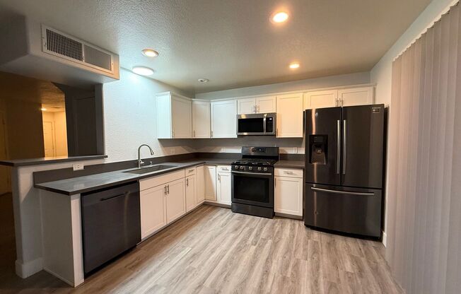 $500 OFF 1ST MONTHS RENT Updated 3-Bedroom Townhome in Gated Community with Pool Access