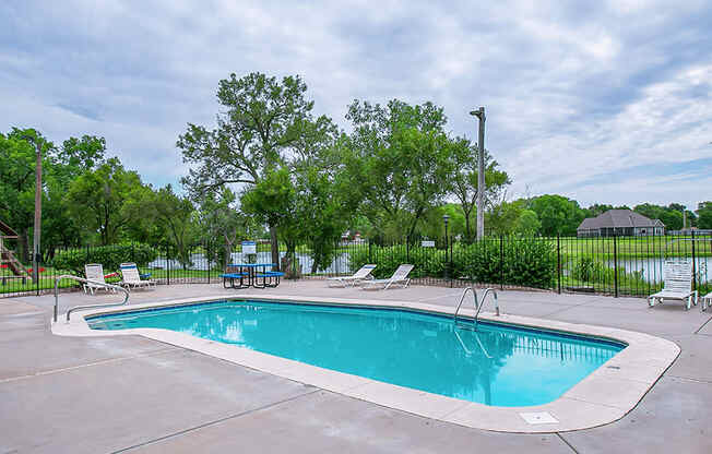 pool at MacArthur's Lake Apartments