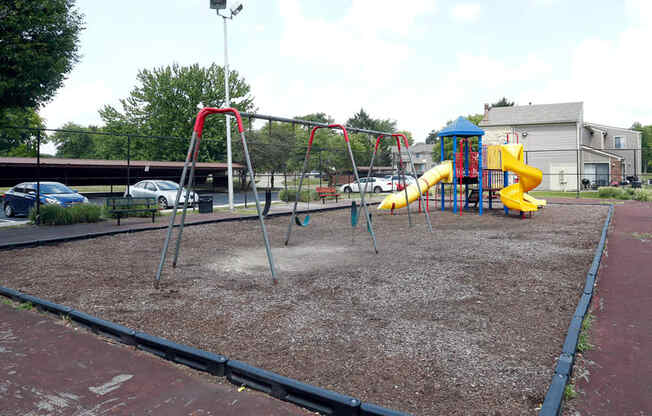 a playground with a slide and monkey bars