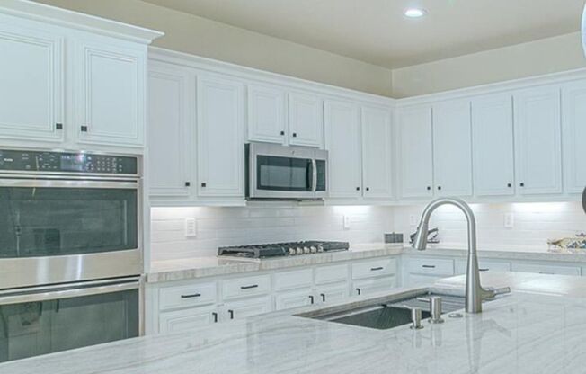 BEAUTIFUL 2 STORY 5 BEDROOM 4 FULL BATHROOM HOME