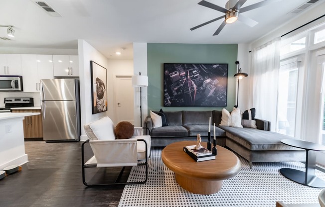 a living room with a couch and a table
