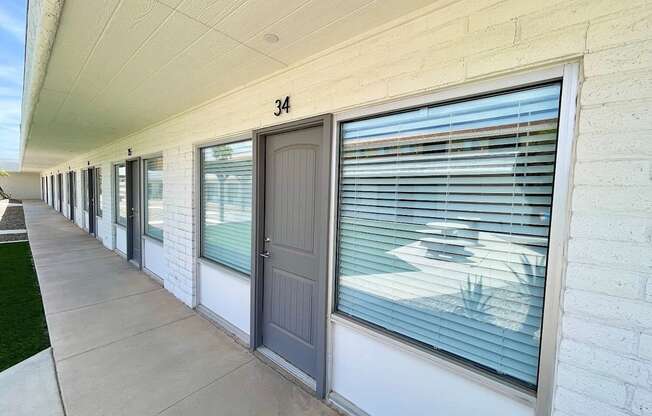 A row of houses with number 34 on the wall.