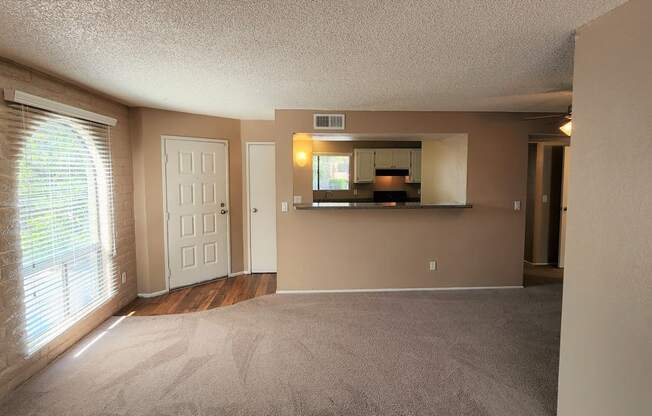 2x2 Upstairs Brown Upgrade Living Room at Mission Palms Apartment Homes in Tucson AZ