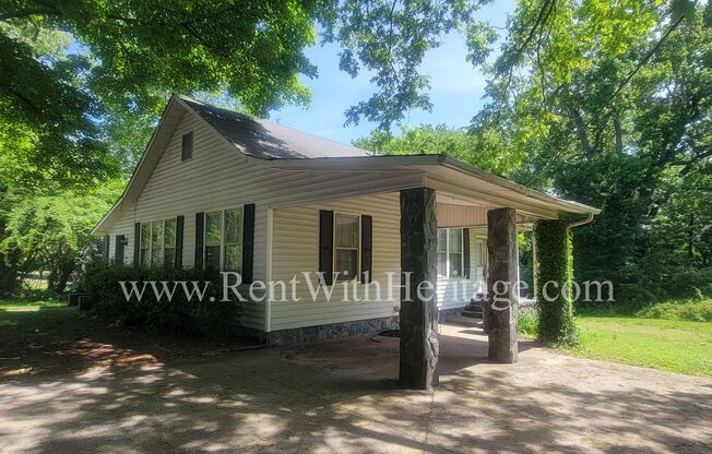 ENJOY THE PRESTIGE OF THIS CHARMING HOME IN DOWNTOWN HISTORIC DISTRICT / 2 BEDROOMS PLUS AN OFFICE