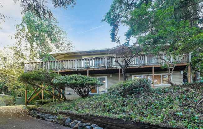 Great Lake Oswego Home with Wrap-around Deck is Located in the Sought-after Hallinan Neighborhood!