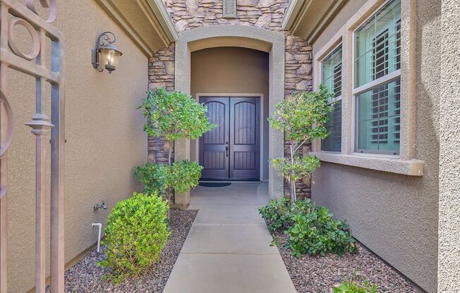 Stunning 1-story home in the prestigious Club at Madeira Canyon guard gated community!