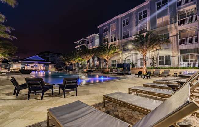 Resort-Style Pool & Sundeck Lit Up At Night