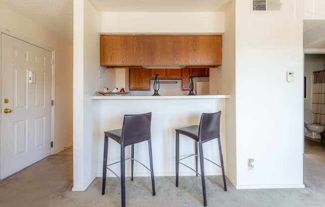 Kitchen with wooden cabinetat Coventry Oaks Apartments, Overland Park