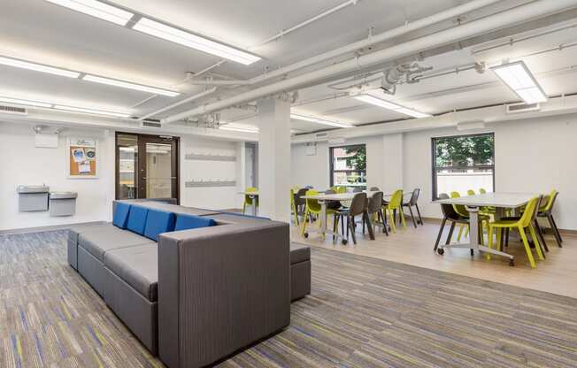 a room filled with furniture and a large window