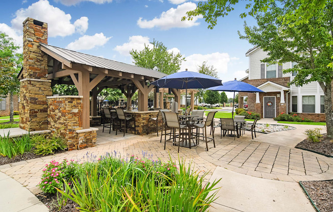 the preserve at ballantyne commons courtyard with tables and umbrellas