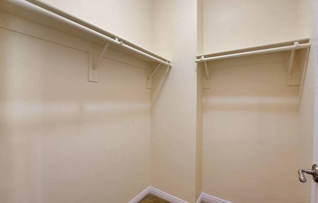 A white door with a silver handle is on the right side of the image.