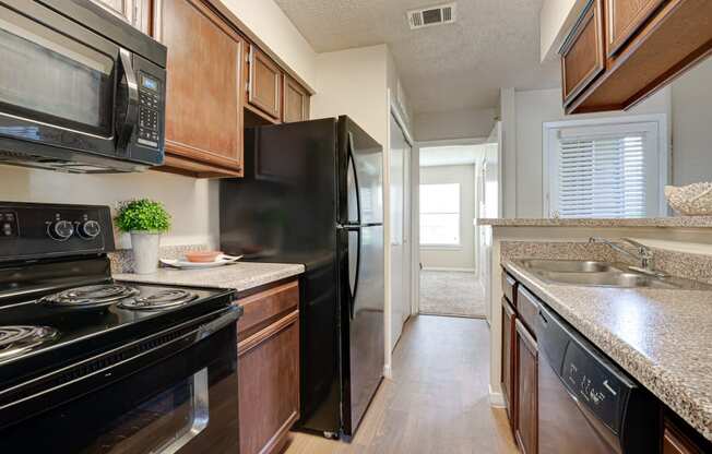 Fully Equipped Kitchen at Woodland Hills, Irving, 75062