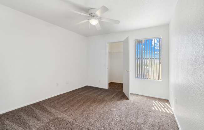 Bedroom with walk in closet at Bella Vita Apartments