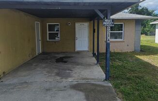 2/2 DUPLEX  WITH CARPORT