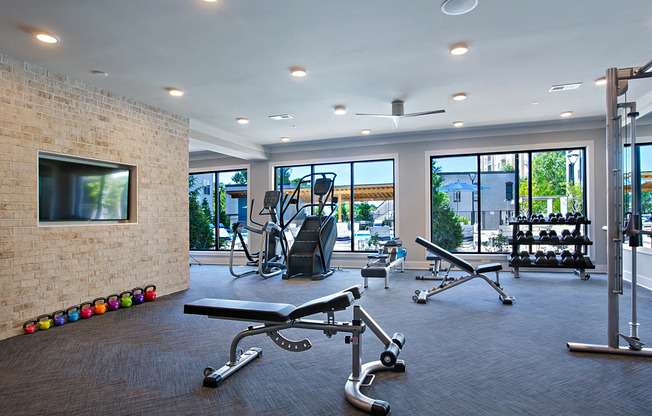 Fitness Center Eliptical and Weight benches