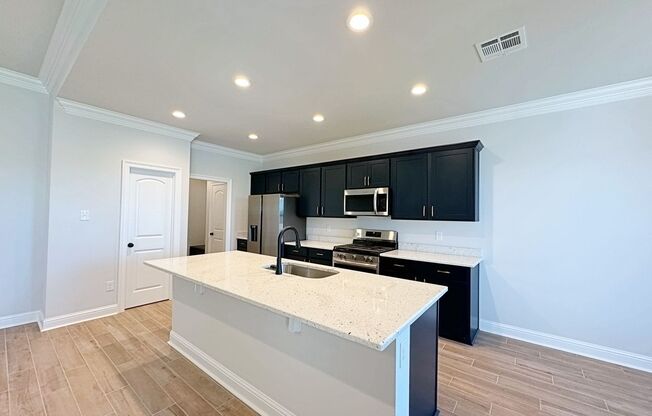 3 Bedroom House located off Burbank that sits on the Community Lake