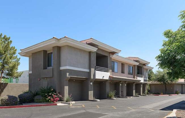 A row of houses with a clear blue sky above.