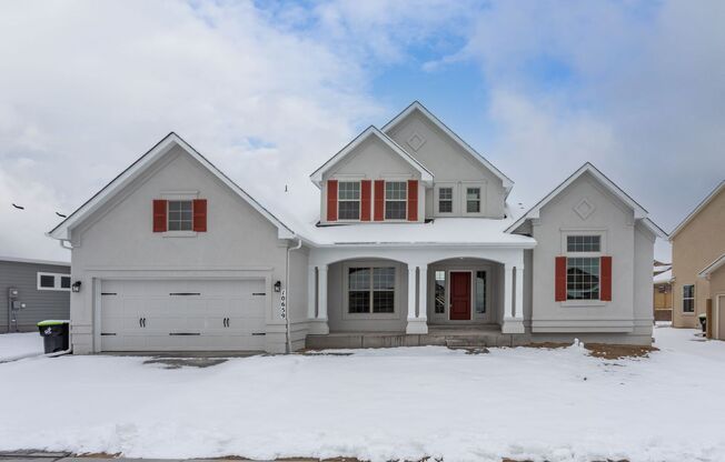 Exceptional 4-Bedroom Home with Dual Fireplaces, Main Level Master Suite, and Spacious Basement - A Must-See!