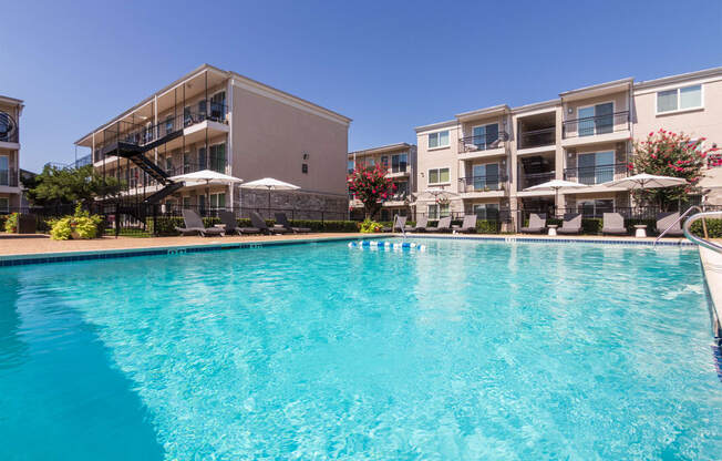 This is a photo of the pool area at The Summit at Midtown Apartments in Dallas, TX.