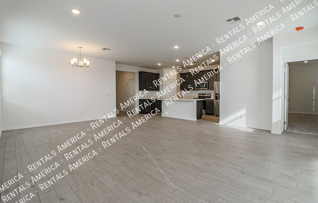 15175 W Desert Bloom St