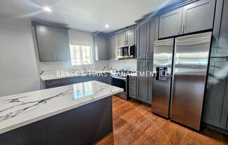 1551 W 103 ST