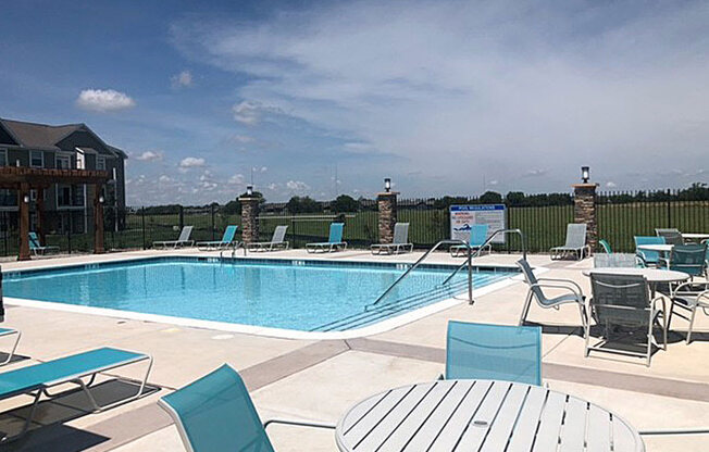Poolside Lounge Area at Copper Creek Apartment Homes in Maize, Kansas