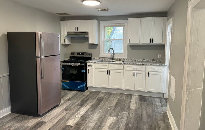 Newly renovated 4 bedroom 2 level apartment.