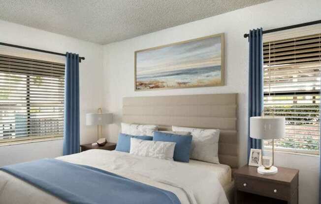 A bedroom with a large bed and a painting on the wall.