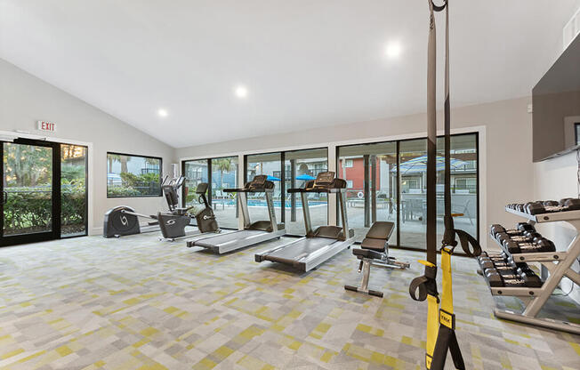 Community Fitness Center with Equipment at Heron Walk Apartments in Jacksonville, FL.