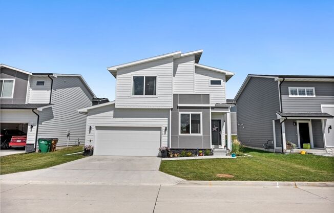 Charming Modern Home in Prime Grimes Location with Stylish Finishes and Cozy Outdoor Space