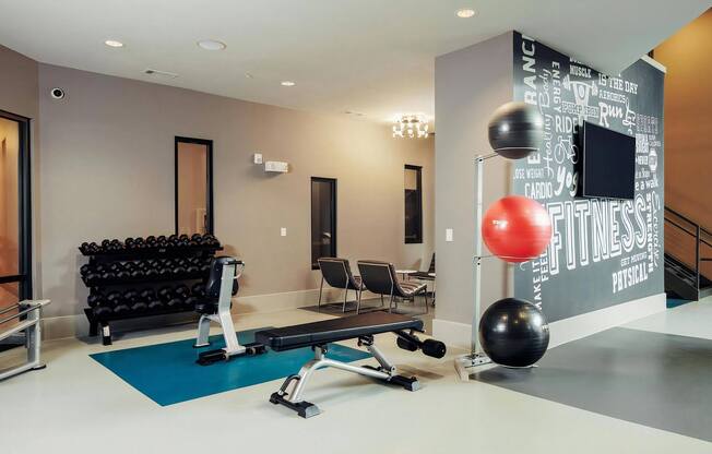 Studio with Free Weights and Exercise Equipment
