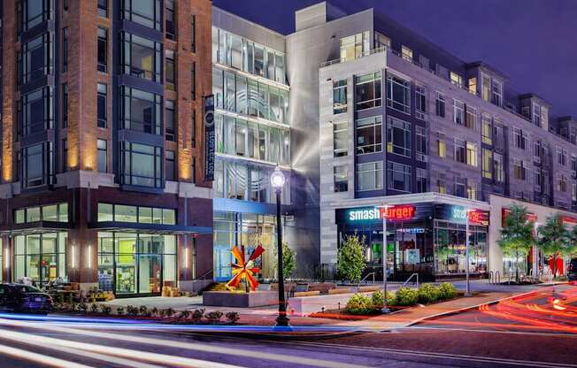 A Smashburger restaurant is lit up at night.