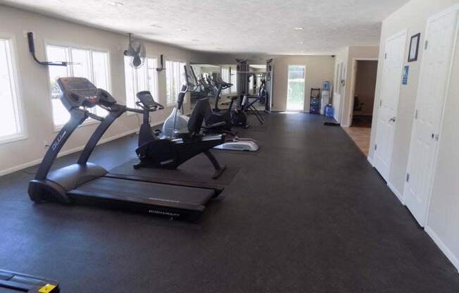 fitness center with lots of machines