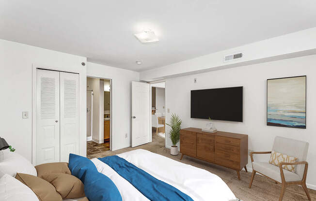 a bedroom with an attached bath at Fieldstream Apartment Homes, Iowa