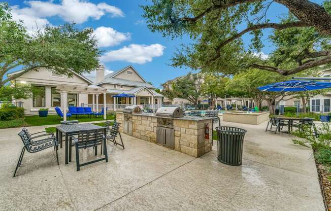 the preserve at ballantyne commons outdoor patio with tables and chairs and a bar