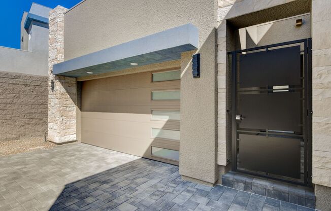 Welcome to your dream home nestled within the prestigious gated community of Tresor at Black Mountain in Henderson.
