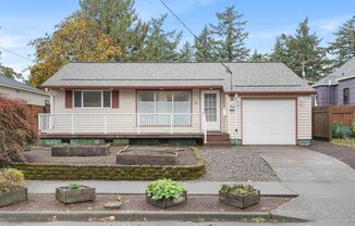 Cozy 2-bdrm/1-bath home in Montavilla—Family room, A/C, converted garage, deck, & great location