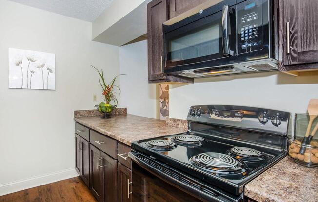 Kitchen cabinets and appliancesat Cloverset Valley Apartments, Missouri, 64114