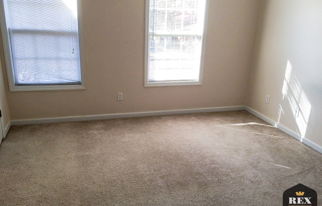 Modern 2 bedroom 2.5 bath Townhome with fenced backyard and Washer/Dryer included!