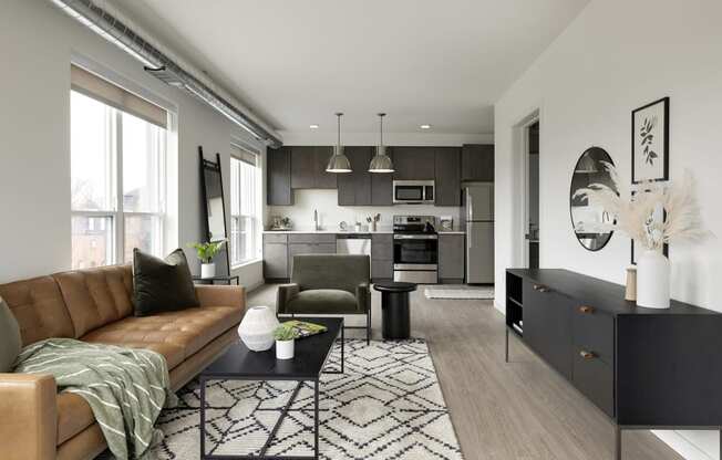 a living room and kitchen in a 555 waverly unit