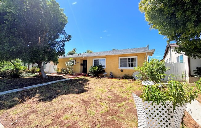 9423 WOODLEY AVE