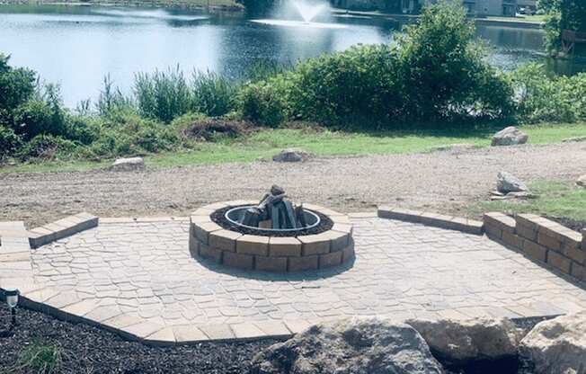 Firepit and pond area at brickyard apartments