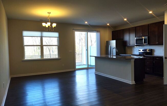 Move-in ready Townhome located in the Pergola at Farmington Community!